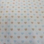 cotone cuoricini beige e azzurri sfondo bianco
